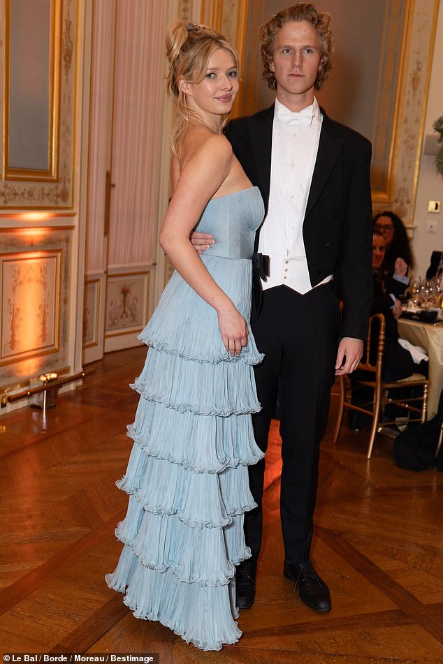 He cut a very elegant figure in a black morning suit paired with a white shirt, bow tie, and black pants.