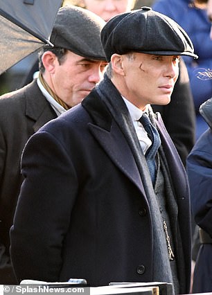 Murphy wore Shelby's signature coat and a Baker Boy cap on Sunday