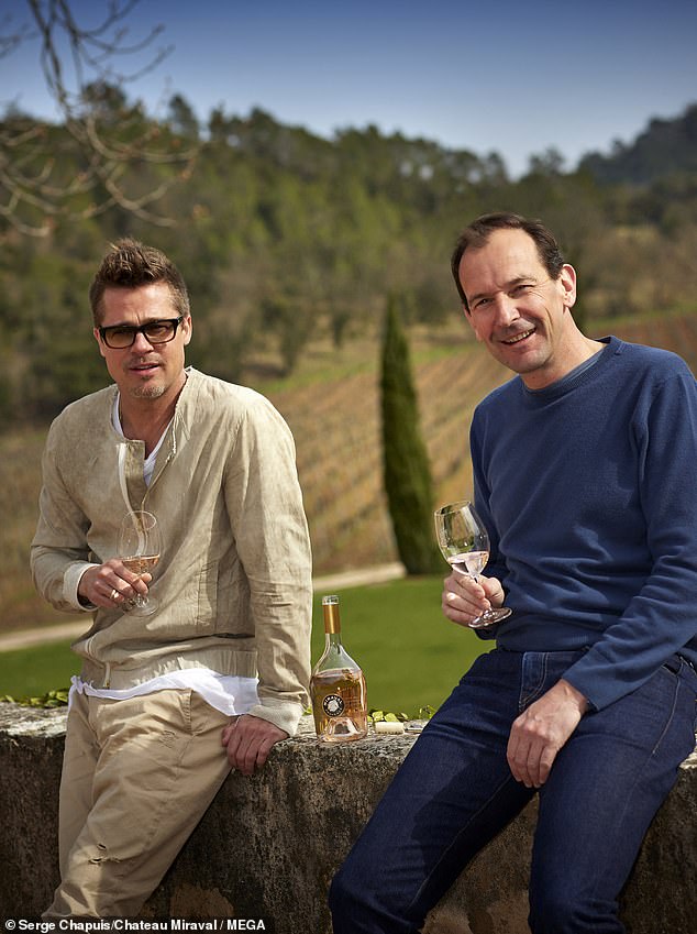 In the ongoing legal battle, Brad Pitt demanded his ex-wife hand over documents from previous agreements she had entered into with third parties after she claimed he had backed out of the deal due to its 'cruel' NDA clause. He is pictured at the castle with his business partner Marc Perrin.