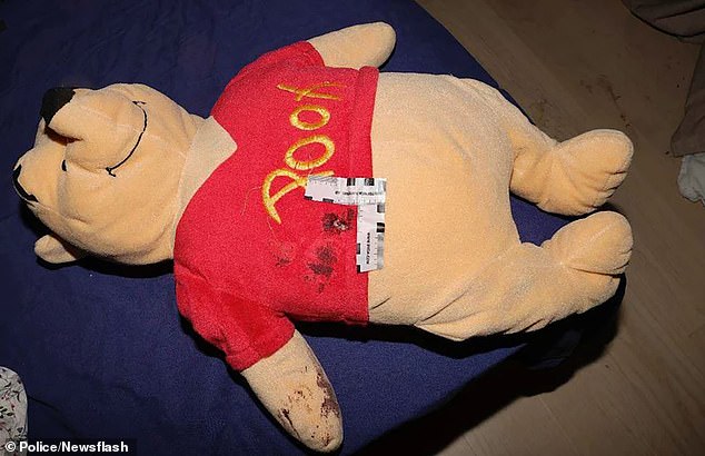 The image shows the Winnie the Pooh stuffed animal, undated, held by the two-year-old girl when she and her mother were shot in Stockholm, Sweden, on October 12, 2023.