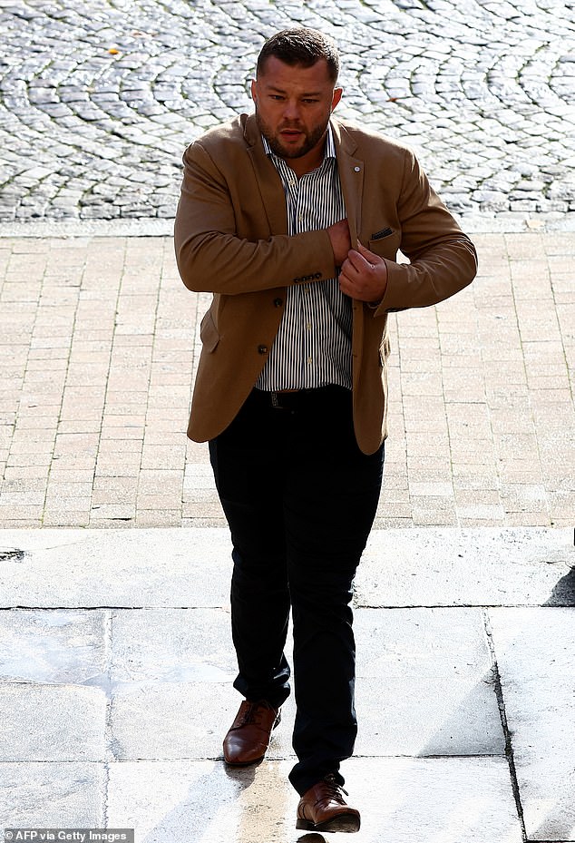 French rugby player Loick Jammes, accused of gang rape, arrives for his trial at the courthouse in Bordeaux, southwestern France, on December 2, 2024.