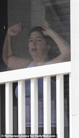 Komoroski appears determined to get back into pre-prison shape as a video, exclusively obtained by DailyMail.com, showed her working out on her balcony