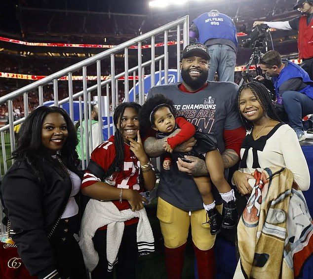 Williams pictured last year alongside his partner Sondra and their three daughters