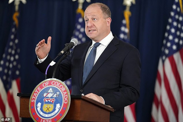 Colorado Governor Jared Polis accused Biden of putting 