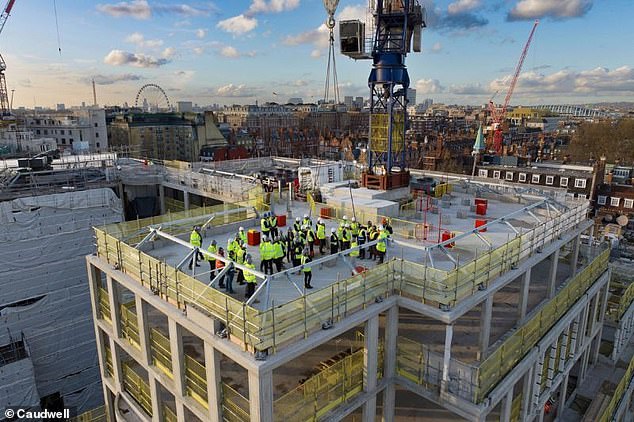 Pricing details of John Caudwell's spectacular Mayfair development have now been revealed and only those with the deepest pockets can hope to afford one of the luxury homes. In the photo: building completion ceremony.