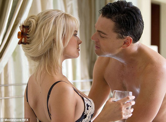 The Australian star revealed that the two were supposed to be reading a kiss scene when she decided a slap would be more dramatic. (Robbie and DiCaprio photographed in the film)