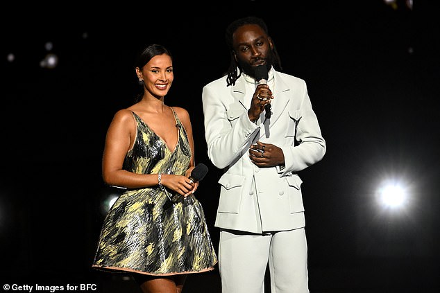 When Maya took the stage to present the prestigious ceremony alongside Kojey Radical, she took the opportunity to put on a flirty minidress, covered in brush strokes.