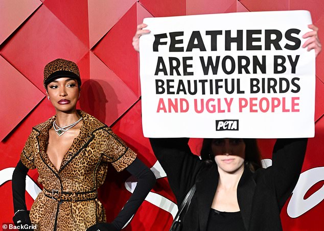 The activist held up a large sign condemning the use of fur and said: 