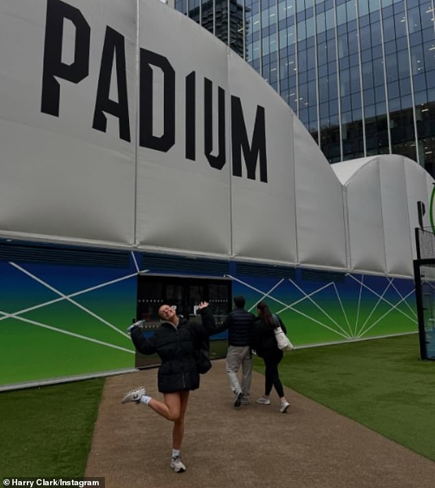 In one snap, Anna smiled and struck a silly pose outside the Padium Padel Club in London before a training session.