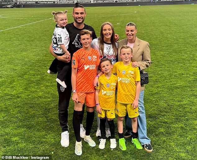 Billi and Andy share children Arlo, eight, Wolf, six, and Marvel Mae, as well as daughter and son from a previous marriage, Emilie Rose, 15, and Lucas, 14 (pictured all together).