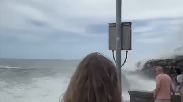 The young woman was claimed by the sea while sitting on a rock on the Thai island of Koh Samui