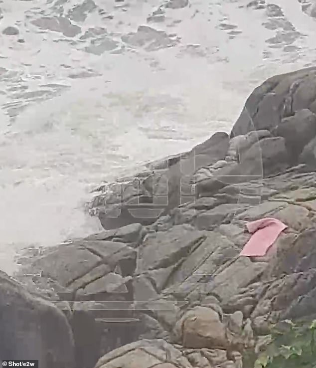 The pink yoga mat was later seen on the rocks after Kamila disappeared beneath the waves.