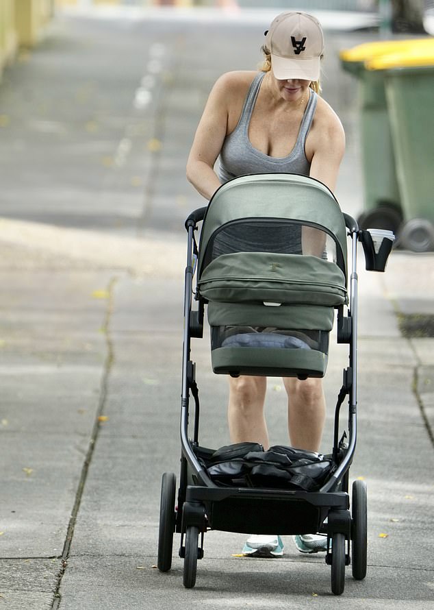 And the Australian model stepped out in the Queensland suburb of Rosalie on Monday with her newborn son, Obi.