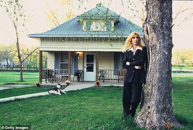 Nelson, pictured outside her Detroit home in 2005, said in 2022 that although she and her son were estranged, she was 