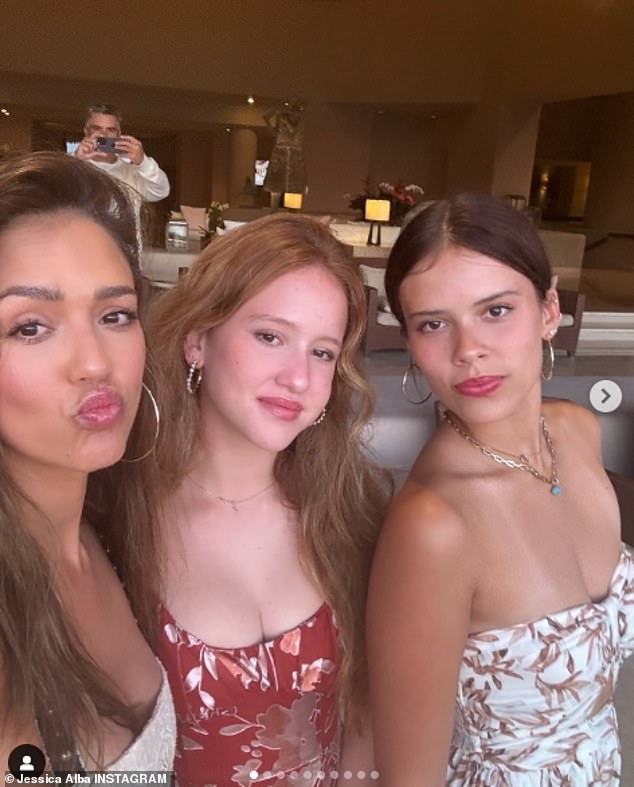 Jessica shared snaps from her recent family getaway to Mexico, including this photo of her husband Cash Warren photographing her with her daughters Honor and Haven.