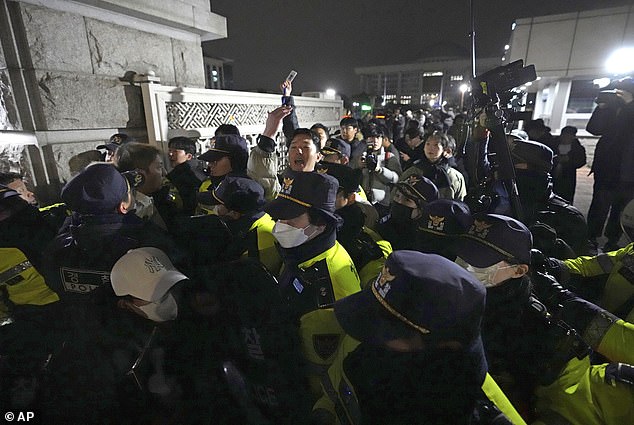 South Korea erupted into chaos after Yoon made the controversial announcement, with protesters swarming Seoul