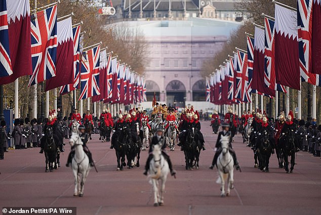 King Charles travels today on the Irish State Coach with the Emir of Qatar, Sheikh Tamim bin Hamad Al Thani, and his wife, Sheikha Jawaher, along the Mall to Buckingham Palace.