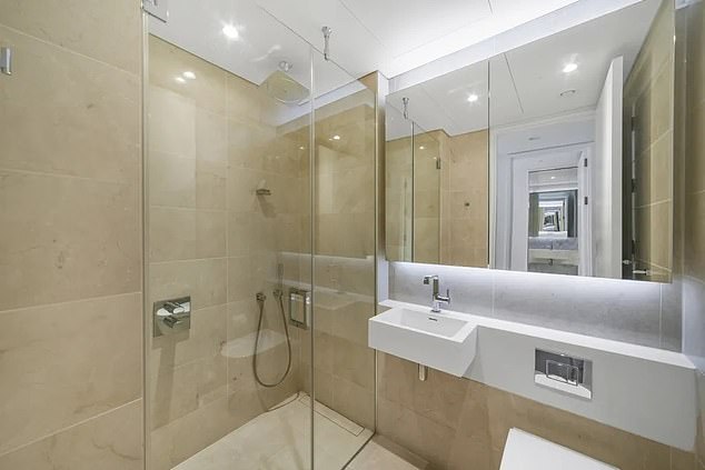 A bathroom in the modern high-rise apartment where Kate had been staying.