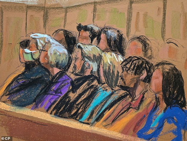 Just over an hour after deliberations began, the jury of seven women and five men, seen here, asked for a read-back of some of the judge's instructions on justification defenses.