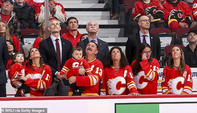 The Gaudreau family watches from the bench during a tribute to Johnny and Matthew Gaudreau