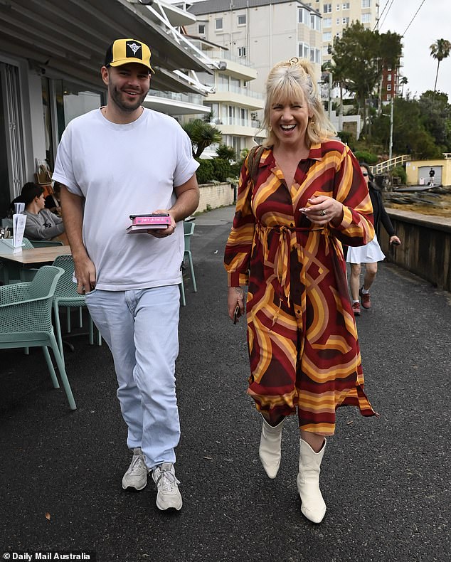 Lucinda, known for her bubbly personality and bold fashion choices, didn't have a care in the world as she stunned in a vibrant geometric print shirt dress.