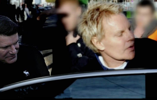 Smith is pictured alongside Jeffries in a shot from the BBC Panorama investigative documentary, after the pair allegedly engaged in sexual activity with a number of men in their New York homes and luxury hotels around the world