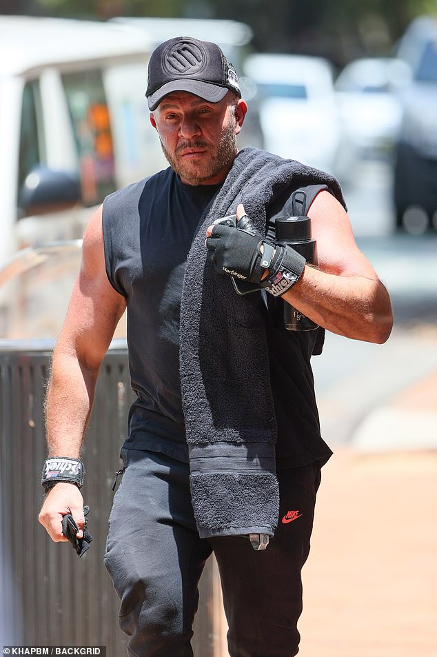 The 61-year-old fashion designer showed off his muscular arms in an all-black ensemble that included a tank top and sweatpants. Alex also wore a fingerless weightlifting glove on his left hand and was seen grabbing another one with his other hand.