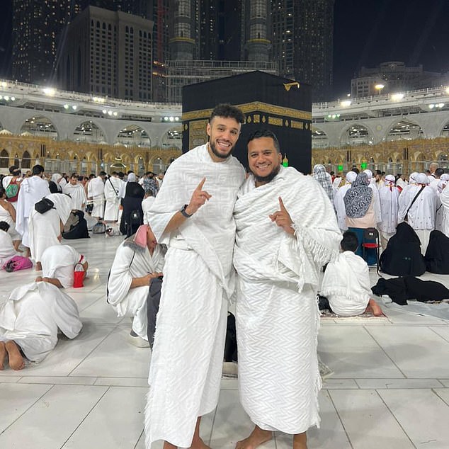 Mazraoui (left), who is a devout Muslim, told his teammates that he would not wear it because of his faith.