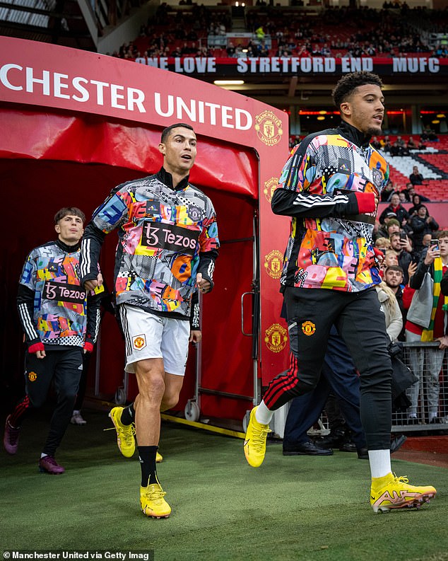 Former United stars Cristiano Ronaldo (centre) and Jadon Sancho (right) pictured wearing the jacket.