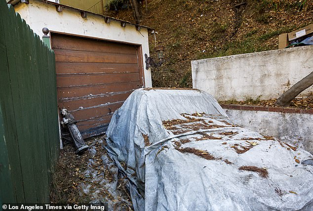 Neighbors said he told them he was a reclusive member of the famous banking family and had an extensive collection of luxury cars