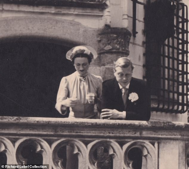 The Duke and Duchess of Windsor stand on a balcony at the Chateau de Cande on their wedding day, June 3, 1937.