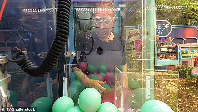 WAG, 38, was joined by Danny Jones, Richard Coles (pictured) and GK Barry, as they took part in the 'Arcade of Agony', where they had to operate a grappling machine filled with balls.