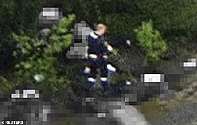 What the police believe is that the gunman Anders Behring Breivik walks with a gun in his hand among the corpses on the island of Utoya. Disguised as a police officer, Breivik went on a 90-minute killing spree in which he slaughtered dozens of people, including children as young as 14.