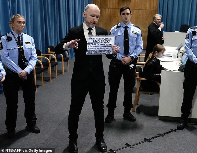 Breivik, who has used his previous court appearances to express extremist views, appeared in court last month wearing a black suit and tie and carrying a sign with various political messages.