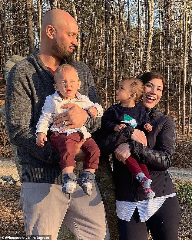 Solo is pictured with her husband, ex-Seahawks star Jerramy Stevens, and their twins