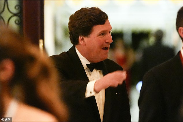 Tucker Carlson has become a prominent figure on Trump's side. He is photographed at the America First Policy Institute gala at Mar-a-Lago on November 14