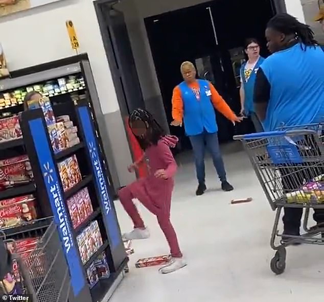 The little girl seemed excited as she stomped on the groceries she threw on the ground