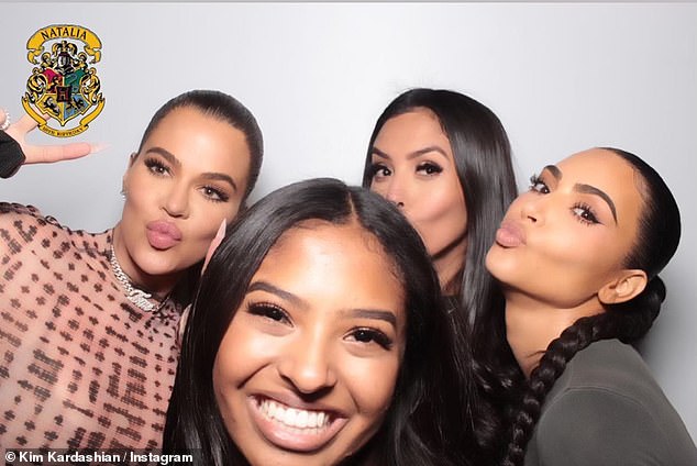 ; Khloe and Kim photographed with Bryant and their daughter for the latter's 19th birthday in January 2021.