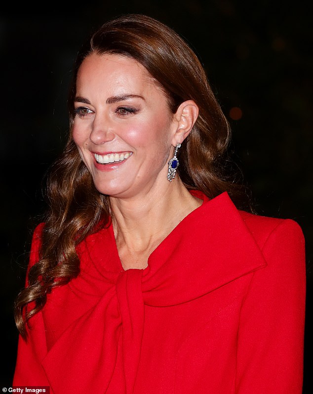 Kate accessorized with the Queen Mother's sapphire and diamond earrings