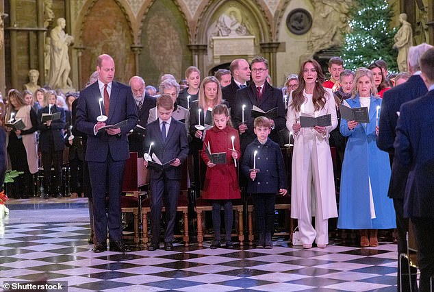 The family sat together during the service and everyone held hymnals as they sang