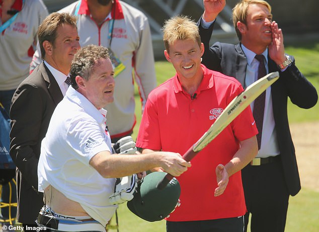 Lee (right) once punched British TV host Piers Morgan (left) in the ribs during a televised Nets session.