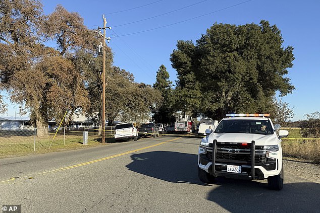 Police tape blocks a road outside the Feather River Adventist School