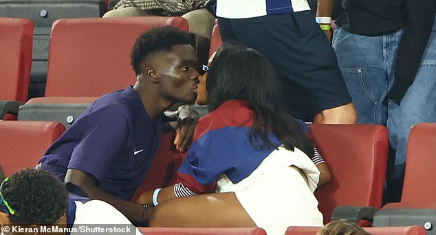 The notoriously private couple broke the code by sharing a public kiss at the England-Slovenia match on June 25.