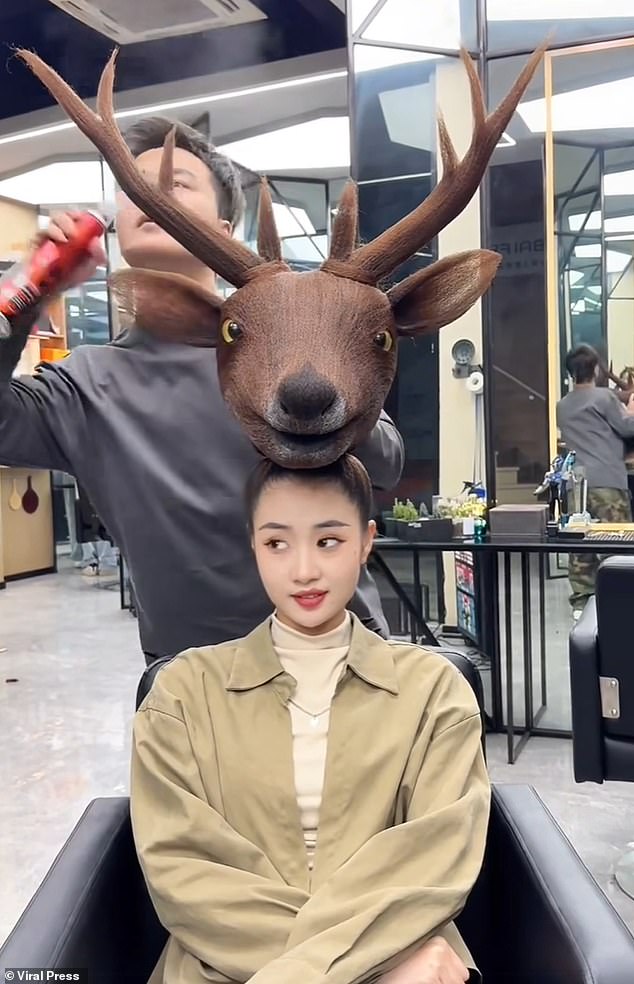 The clip then showed the barber following his antler hairstyle with a realistic teddy bear-style reindeer head.