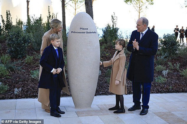 Prince Albert II of Monaco (right) attends with Princess Charlene of Monaco (left), Princess Gabriella (center-right) and Prince Jacques the inauguration of the 'Place Princesse Gabriella' in the new 'Mareterra' district of Monaco, December 4, 2024