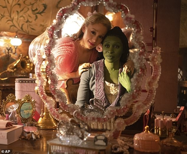 In the film, Glinda, played by Ariana Grande (pictured left), gives Elphaba a makeover during the song Popular.