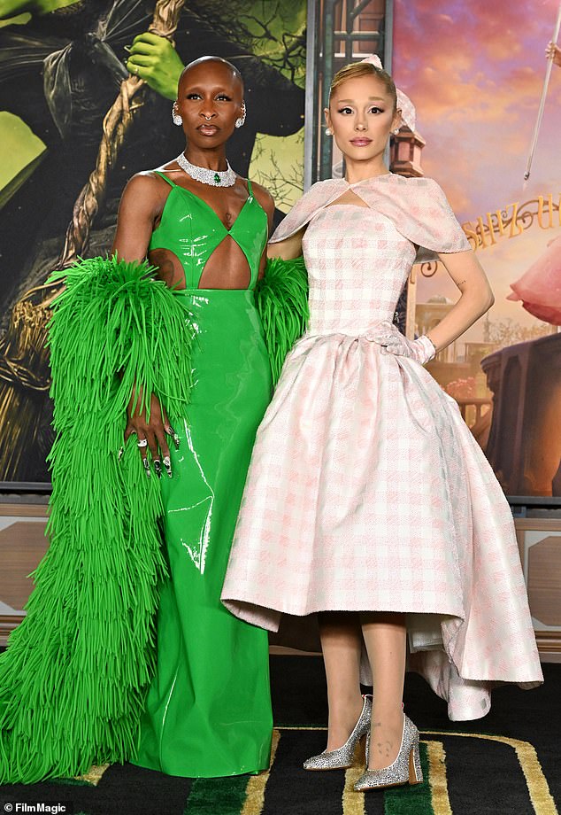 Cynthia Erivo (pictured left) and Ariana Grande (pictured right) play Elphaba and Glinda in the new film (seen together at the Los Angeles premiere of Wicked at the Dorothy Chandler Pavilion in November)