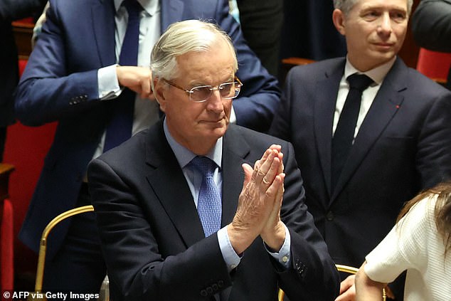 French Prime Minister Michel Barnier gestures following the result of the vote of no confidence in his administration at the National Assembly in Paris on December 4.