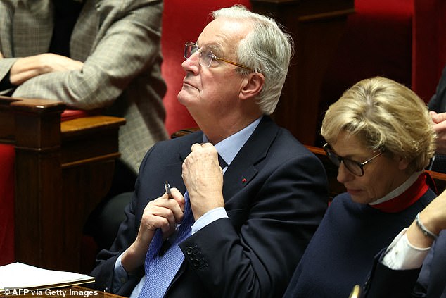 French Prime Minister Michel Barnier attends the debate ahead of the votes of no confidence against his administration at the National Assembly in Paris on December 4, 2024.