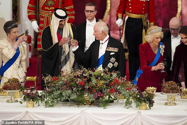 The royal was photographed toasting the long-standing friendship between the United Kingdom and Qatar during the banquet held at Buckingham Palace.